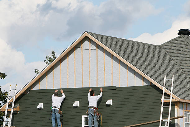 Professional Siding technician working in Church Hill, PA